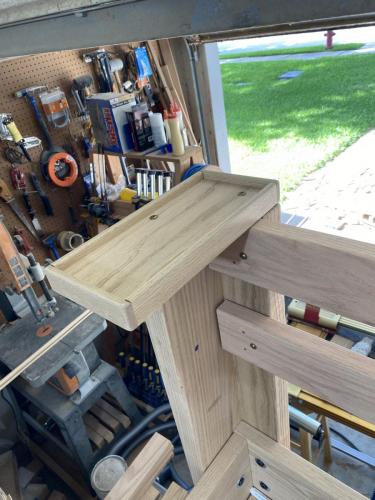 Post-top storage tray for upper bunks